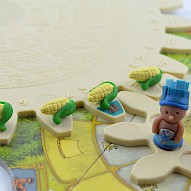 small corn tokens on game gear