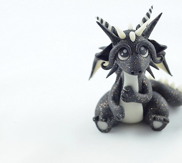 black glitter glow in dark dragon