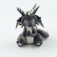 black glitter glow in dark dragon