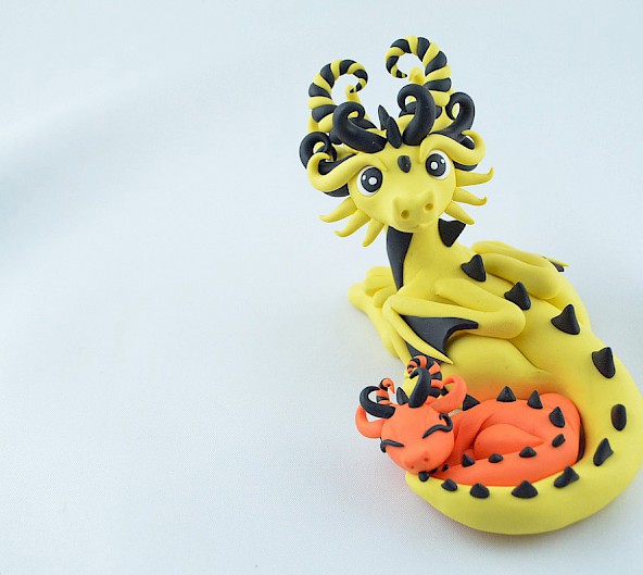 yellow dragon mama with babie