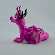 pink dragon with a gem
