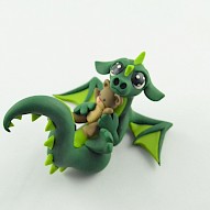 dragon with a teddy bear